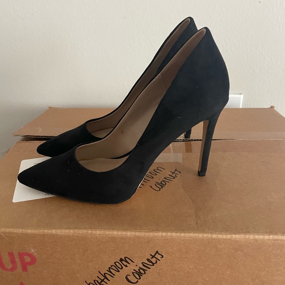 Black suede pumps